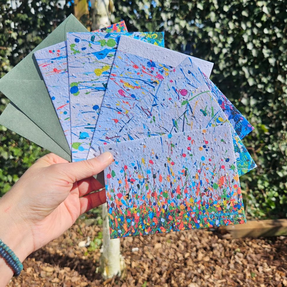 Bloemenveld in een wenskaart